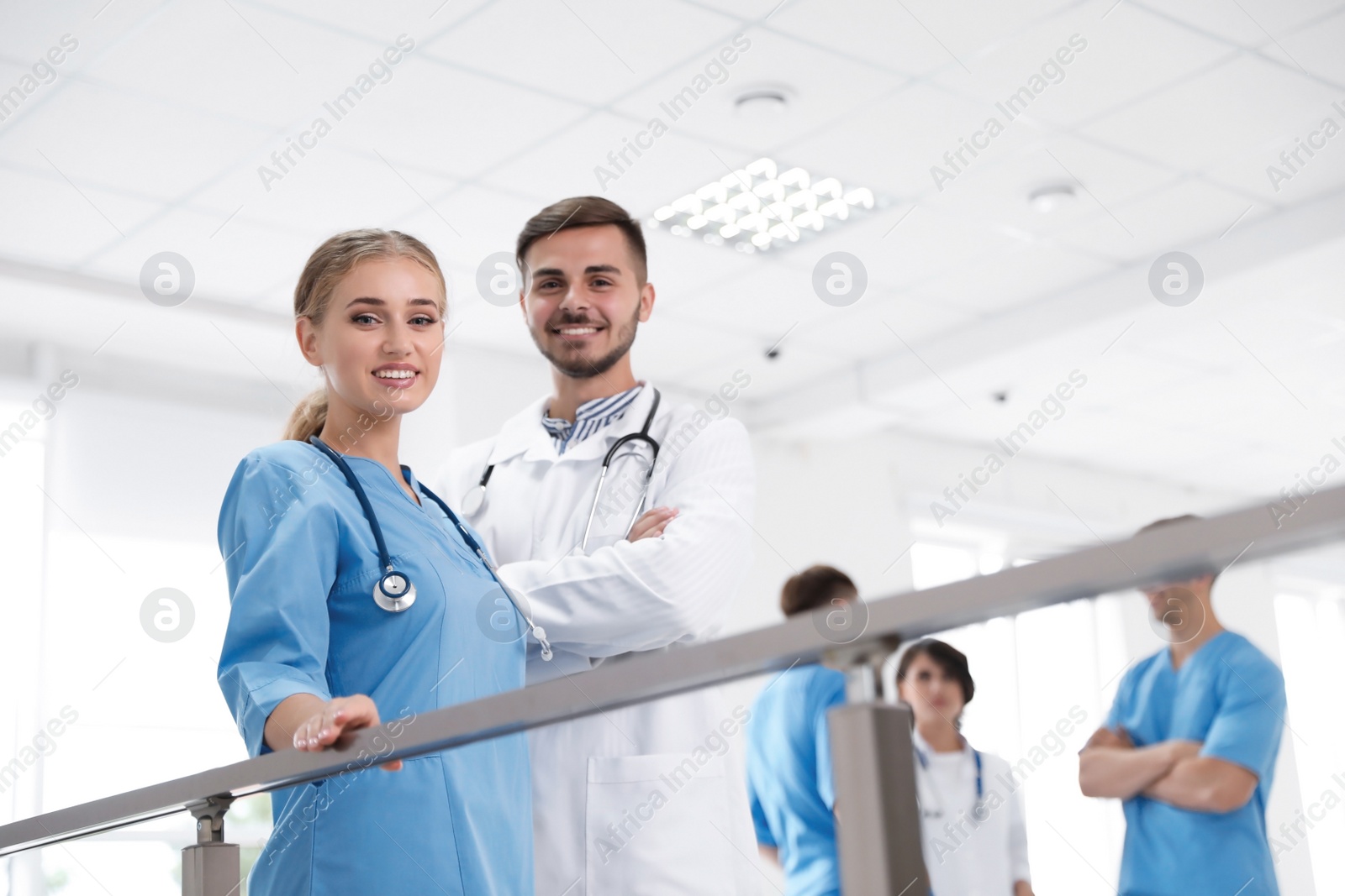 Photo of Portrait of doctors in uniform at workplace