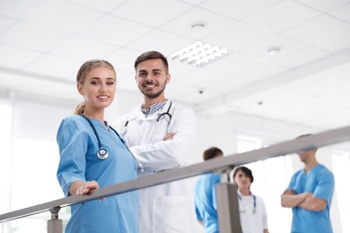 Portrait of doctors in uniform at workplace