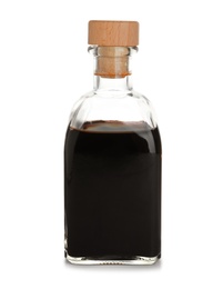 Photo of Bottle with balsamic vinegar on white background