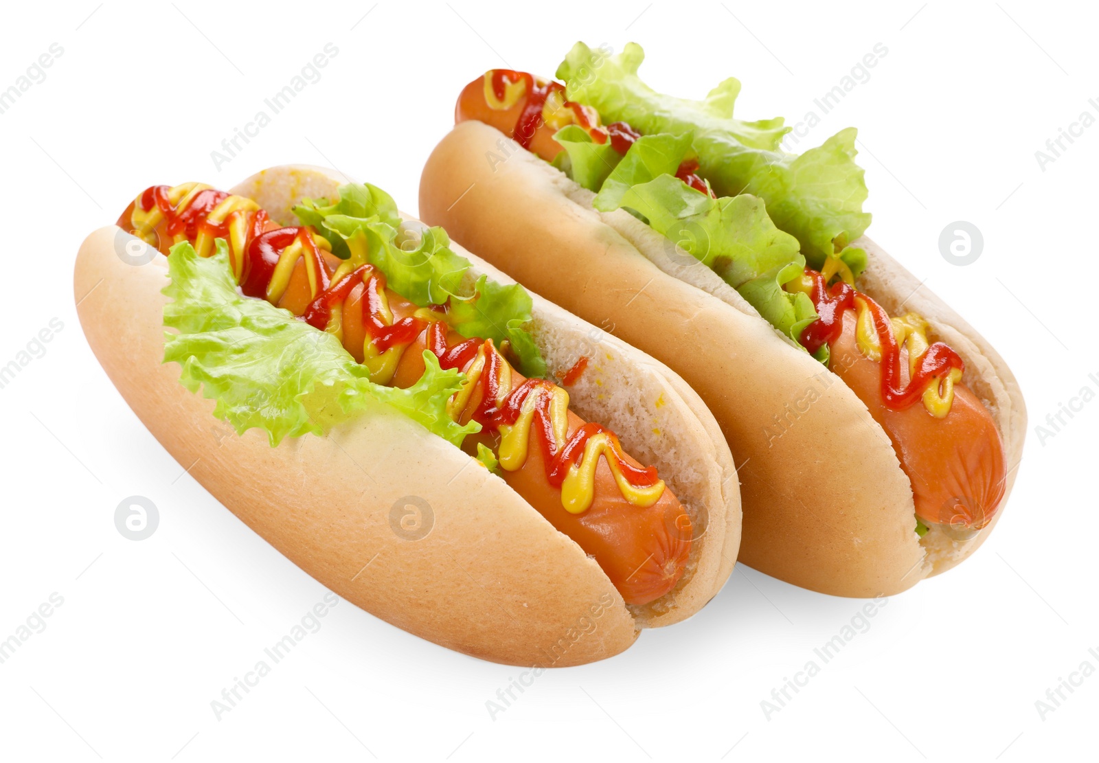 Photo of Tasty hot dogs with lettuce, ketchup and mustard isolated on white