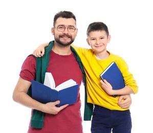 Little boy and his dad with books on white background
