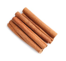 Photo of Aromatic cinnamon sticks isolated on white, top view