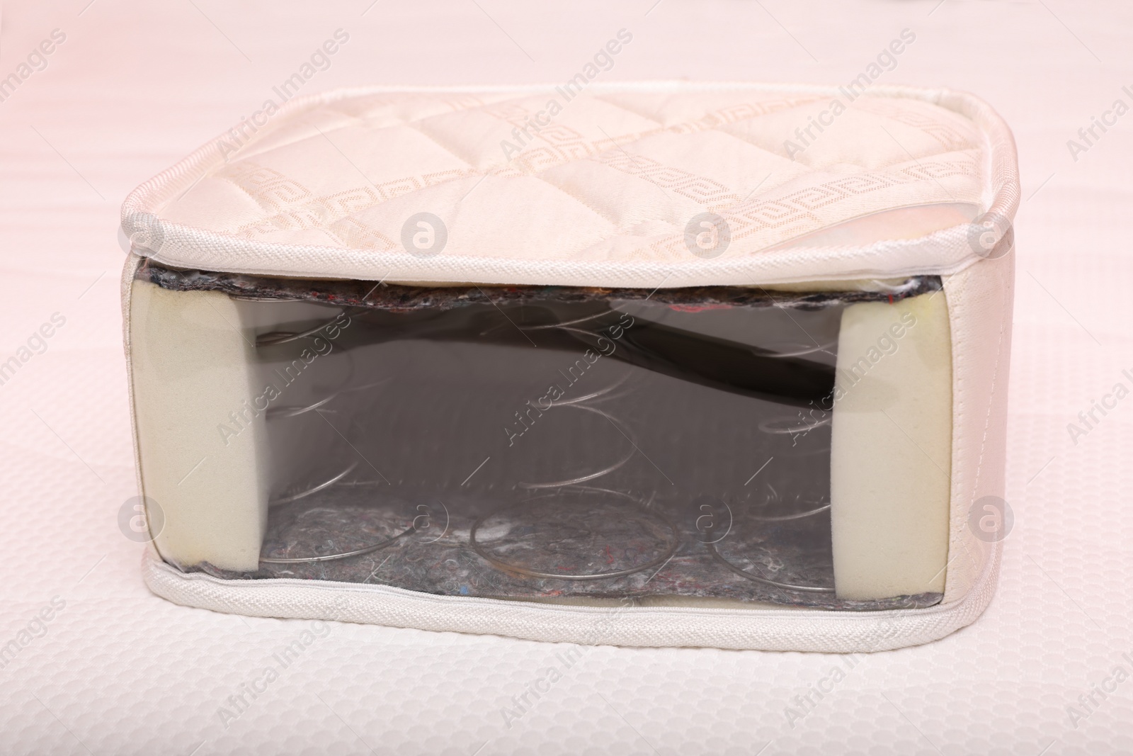 Image of Sample of modern orthopedic mattress on textile