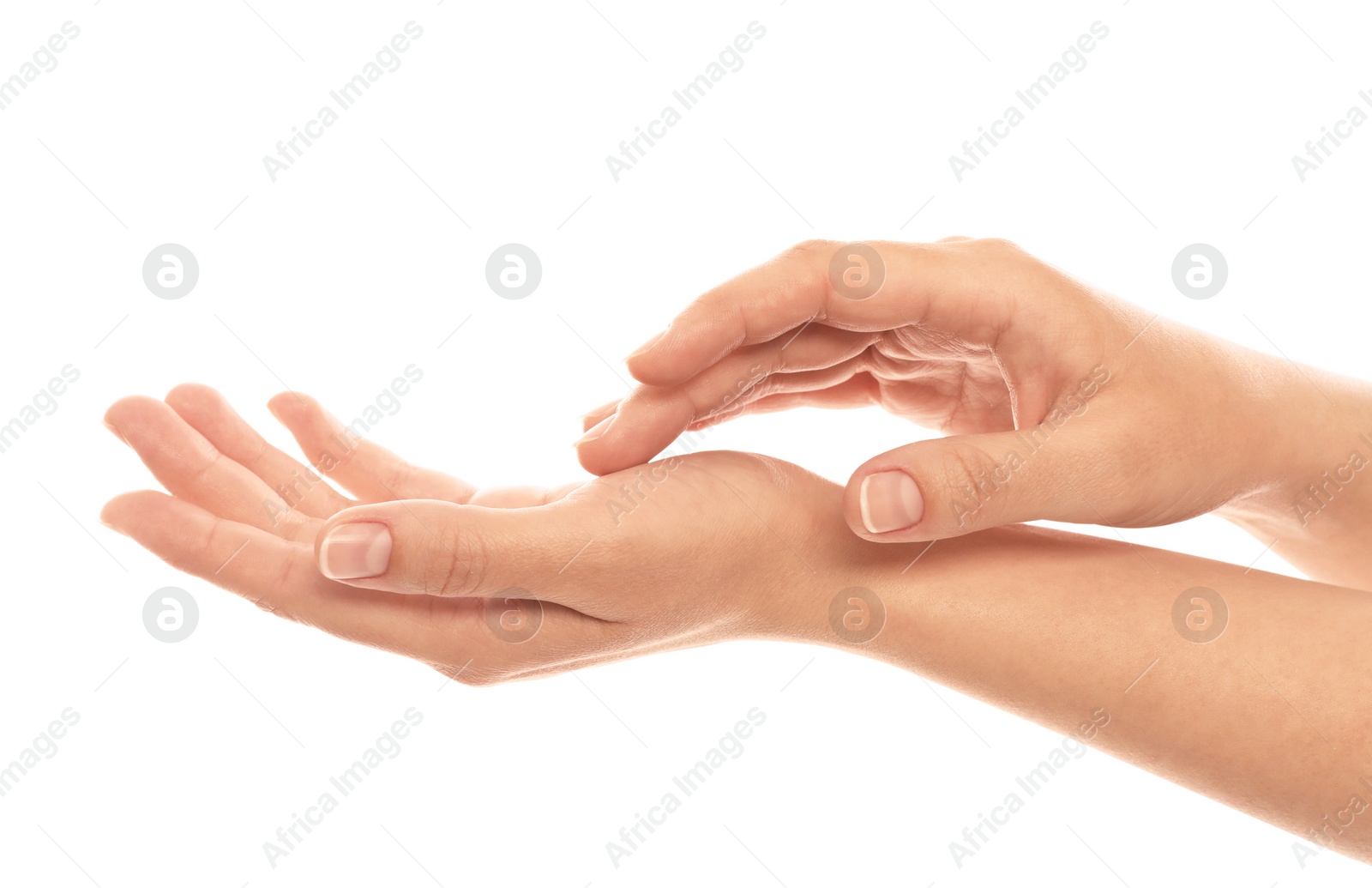 Photo of Young woman showing hands on white background, closeup