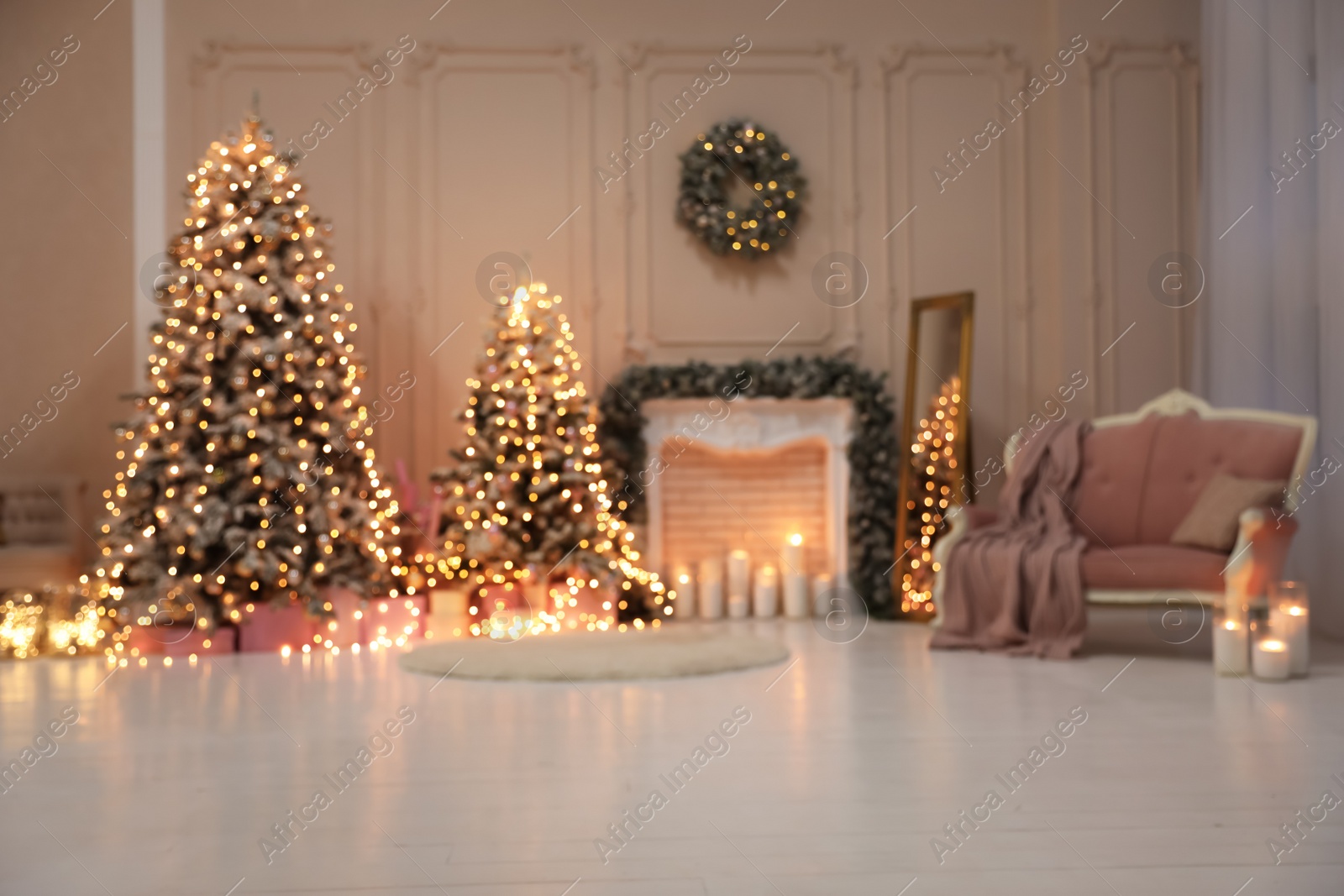 Photo of Blurred view of festive room interior with Christmas trees