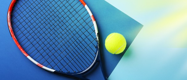 Tennis racket and ball on color background, flat lay. Banner design