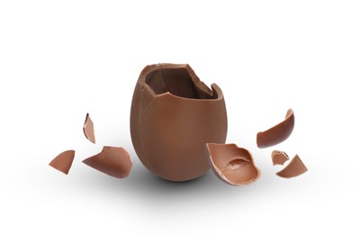 Image of Exploded milk chocolate egg on white background