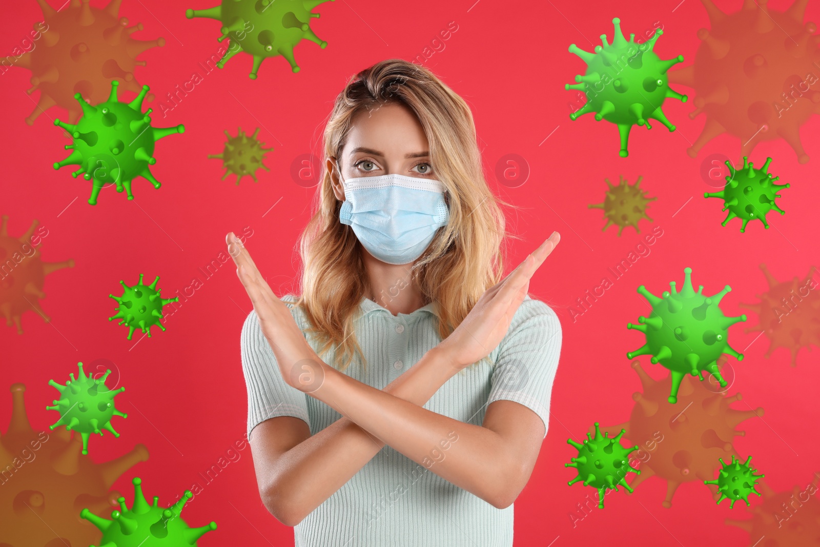 Image of Stop Covid-19 outbreak. Woman wearing medical mask surrounded by virus on red background