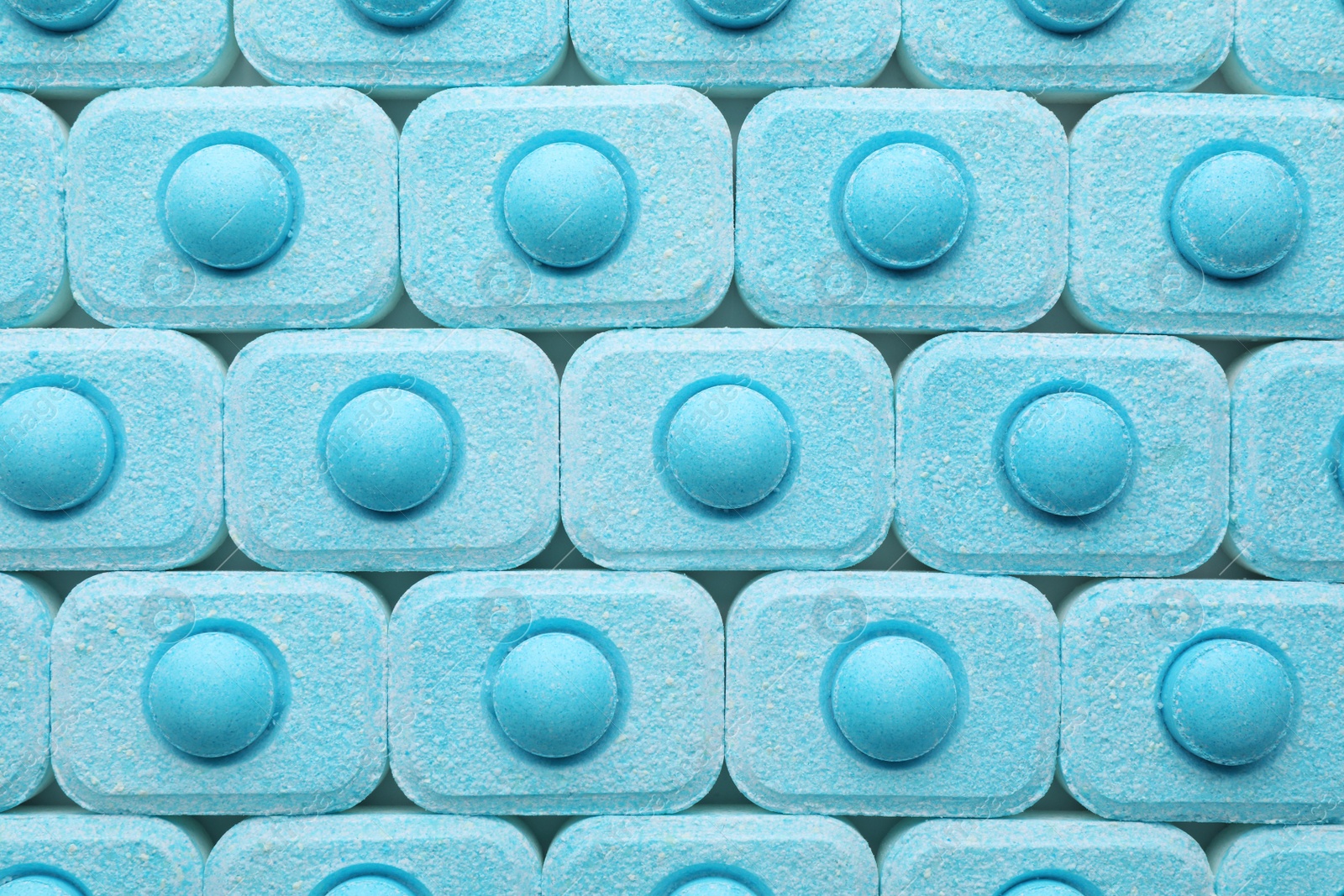 Photo of Many water softener tablets as background, top view