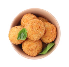 Bowl with delicious fried tofu balls and basil on white background, top view