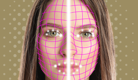 Facial recognition system. Woman with digital biometric grid on dark background