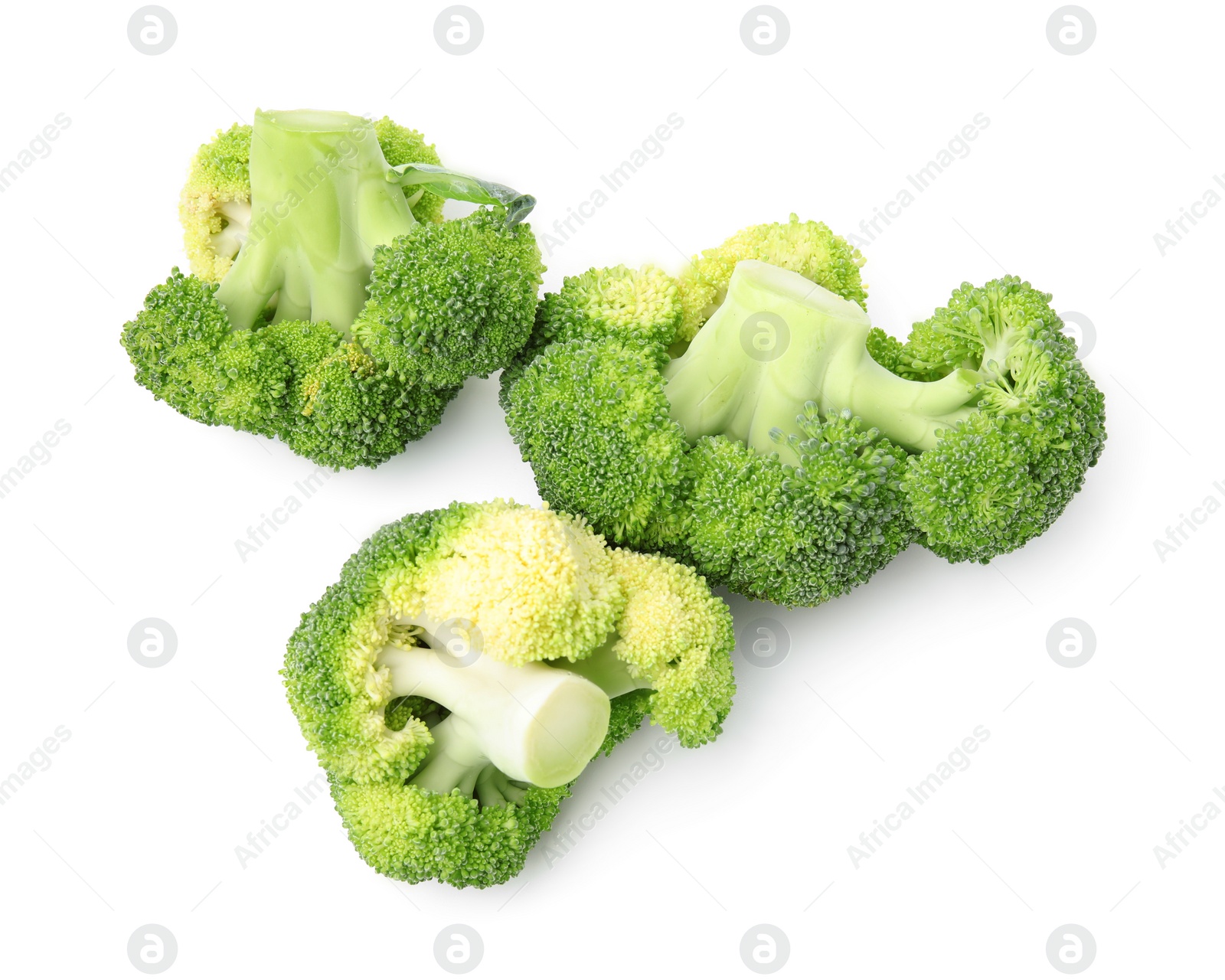 Photo of Fresh raw green broccoli isolated on white, top view