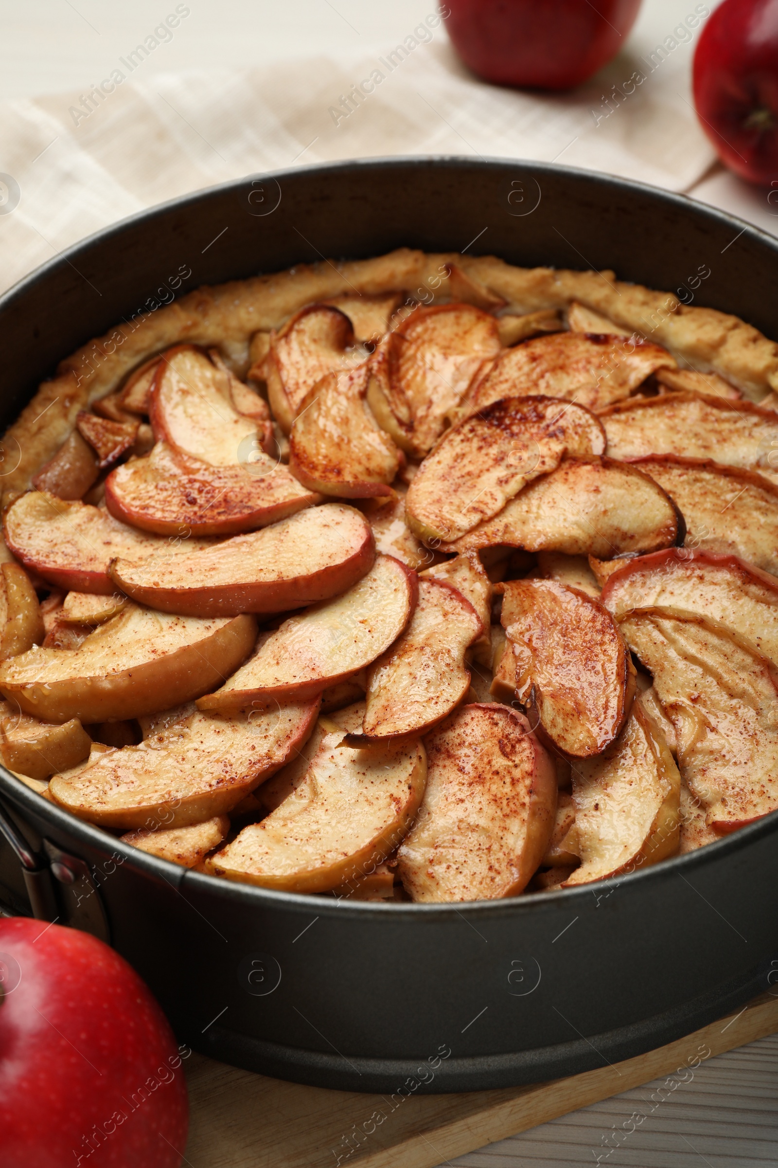 Photo of Delicious apple pie on white table, closeup