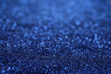 Photo of Shiny blue glitter as background. Bokeh effect