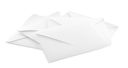 Photo of Heap of paper envelopes on white background