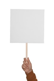 Man holding blank protest sign on white background, closeup