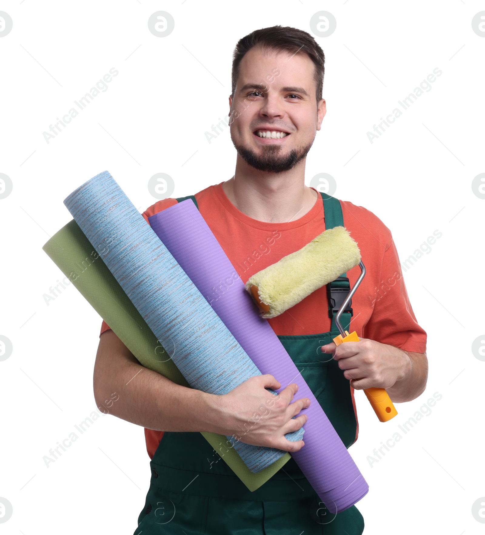 Photo of Man with wallpaper rolls and roller on white background