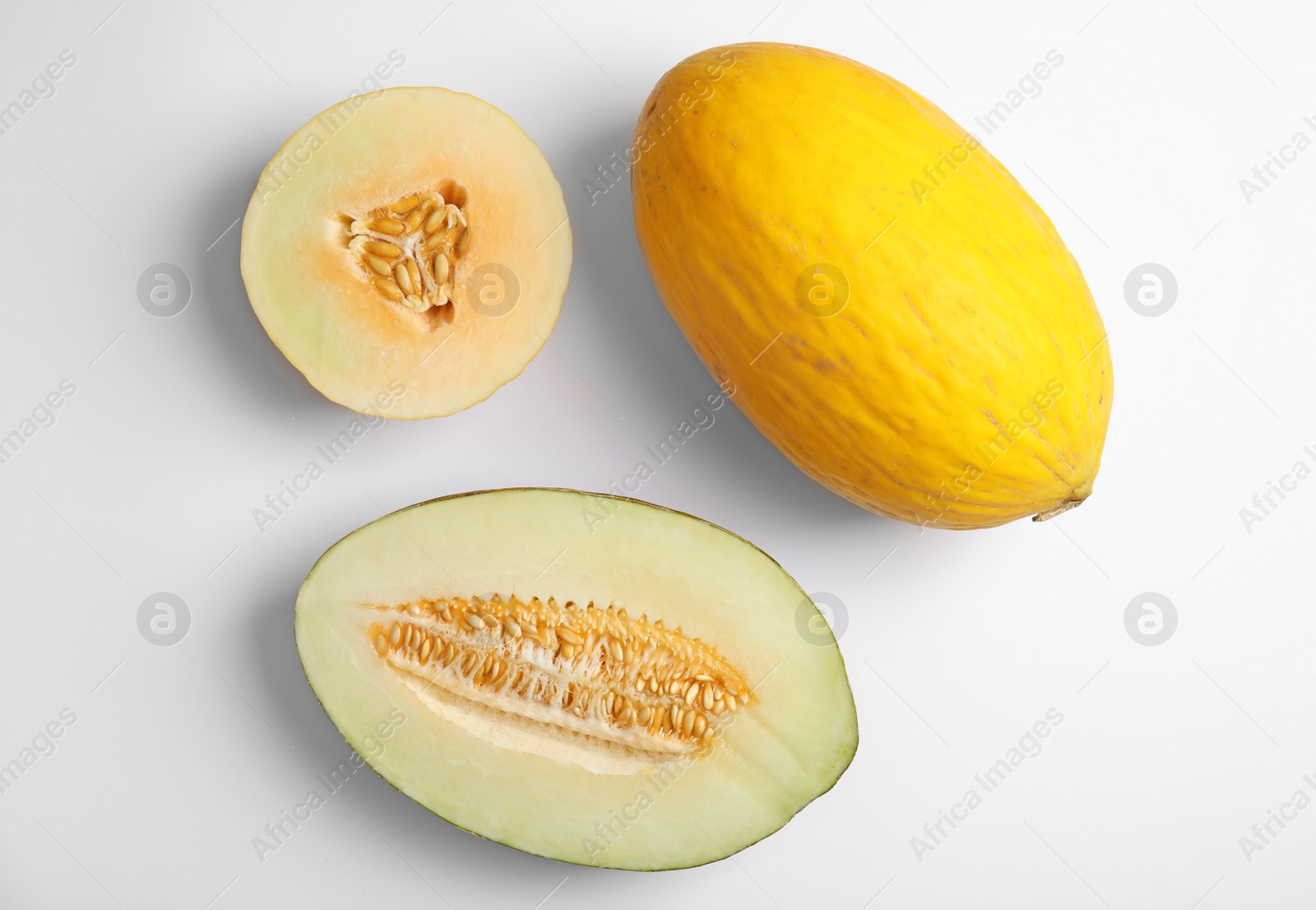 Photo of Flat lay composition with melons on white background