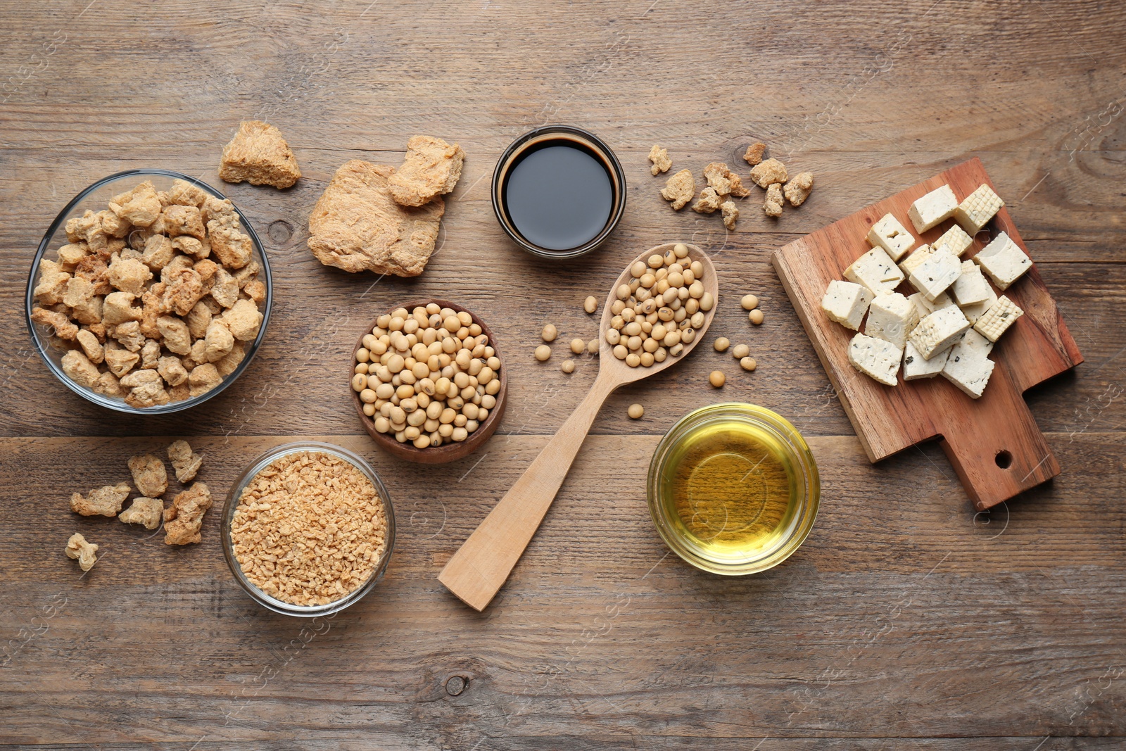 Photo of Different fresh soy products on wooden table, flat lay