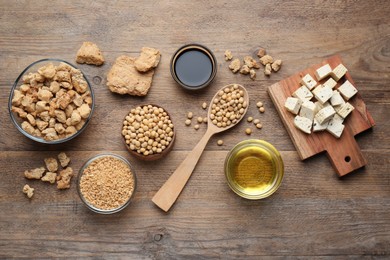Photo of Different fresh soy products on wooden table, flat lay
