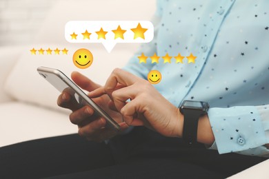 Woman leaving service feedback with smartphone at home, closeup. Stars and emoticons over device