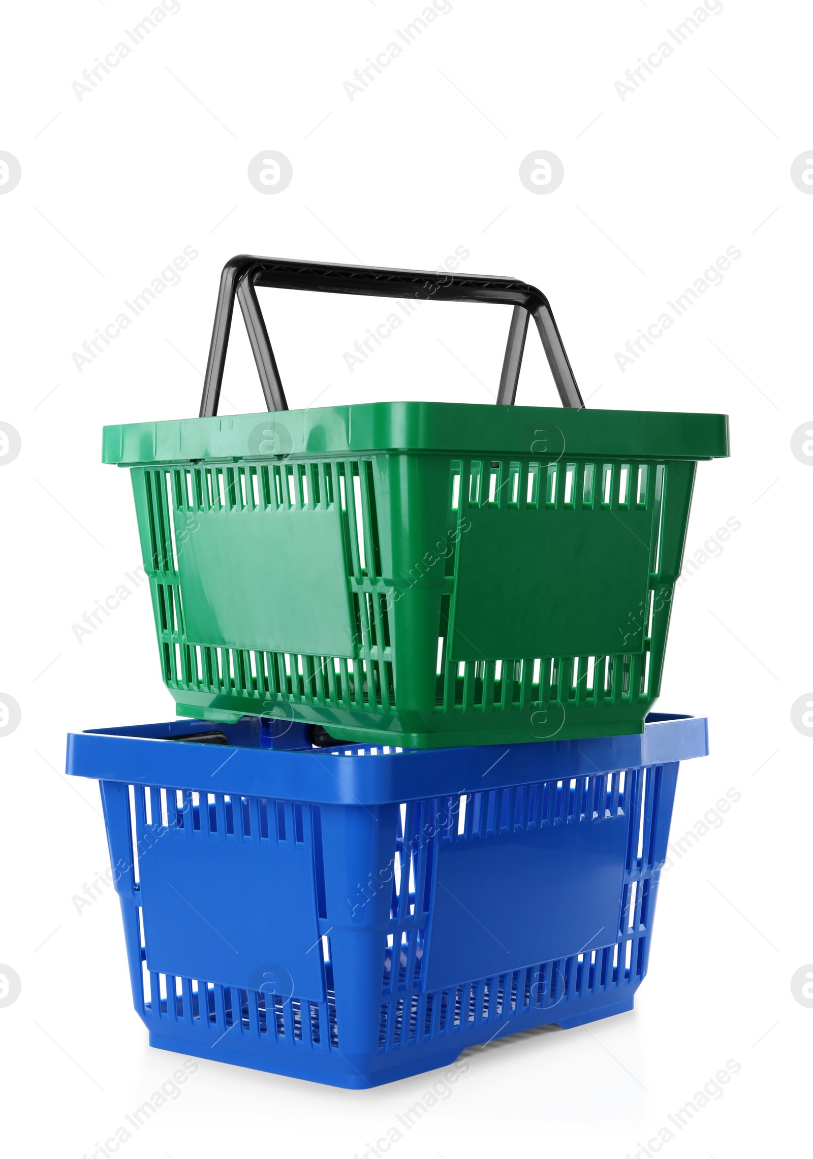 Photo of Color plastic shopping baskets isolated on white
