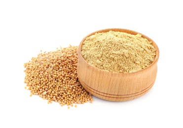 Photo of Aromatic mustard powder in wooden bowl and seeds on white background