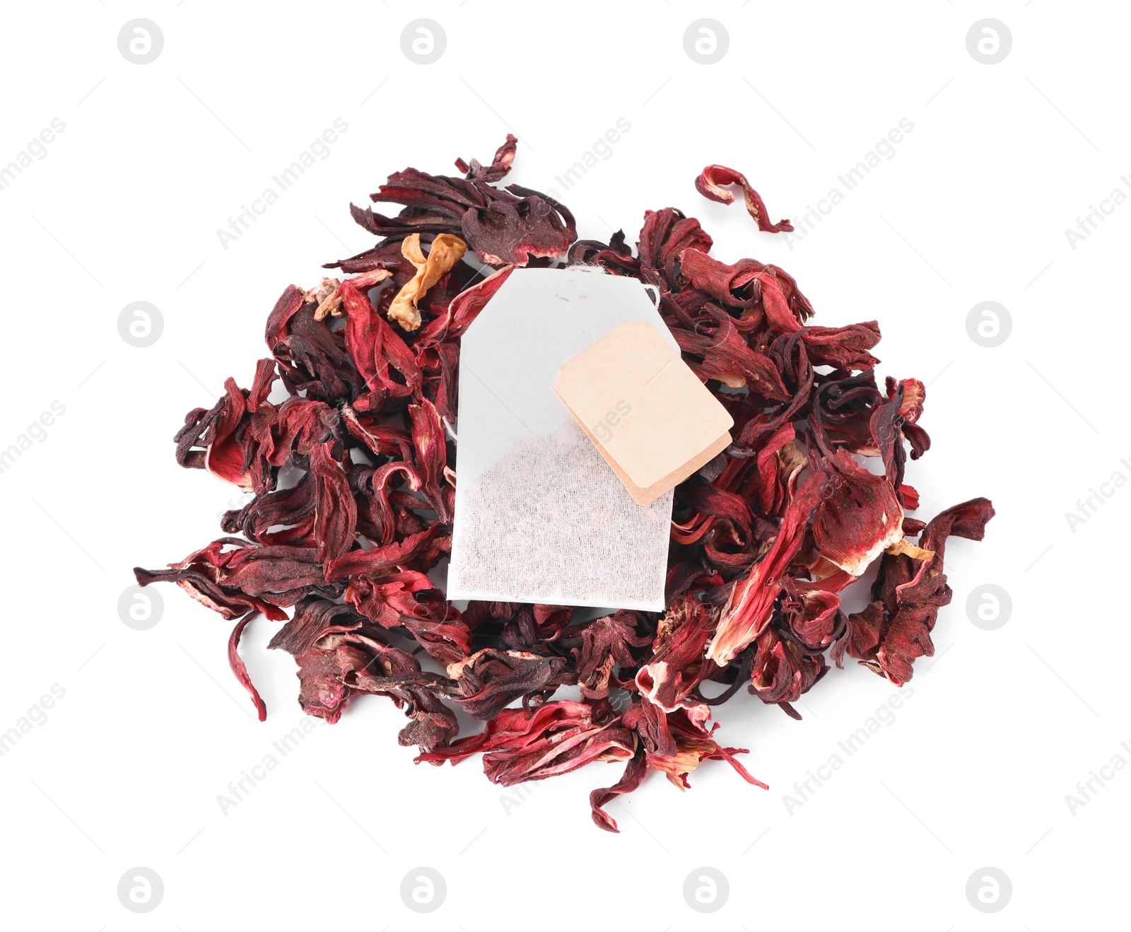 Photo of Pile and bag of dry hibiscus tea isolated on white, top view