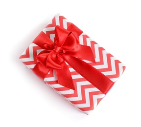 Photo of Beautifully wrapped gift box on white background, top view