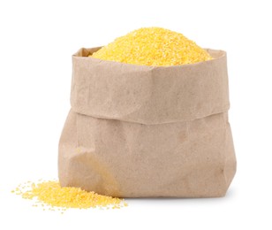 Photo of Raw cornmeal in paper bag isolated on white
