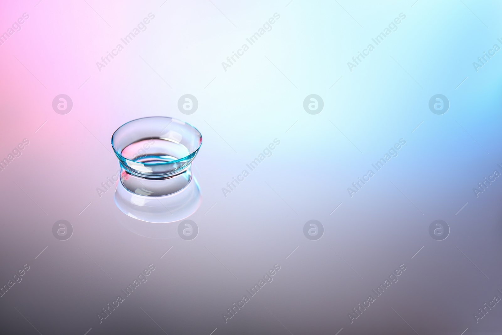 Photo of Contact lens on color background
