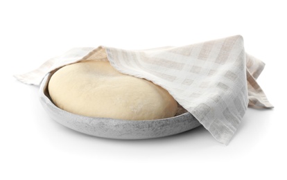 Photo of Plate with raw dough and towel on white background