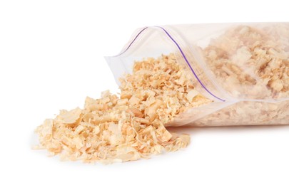 Photo of Natural sawdust with zip bag isolated on white