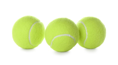 Photo of Tennis balls isolated on white. Sports equipment