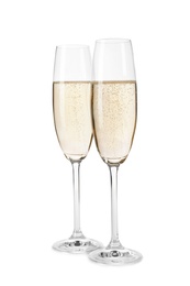 Glasses of champagne on white background. Festive drink