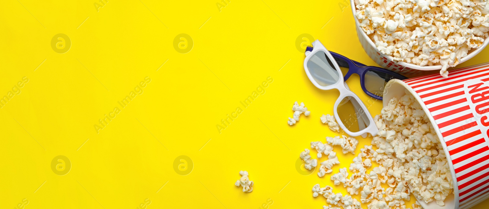 Image of Glasses and popcorn on yellow background, flat lay with space for text. Banner design