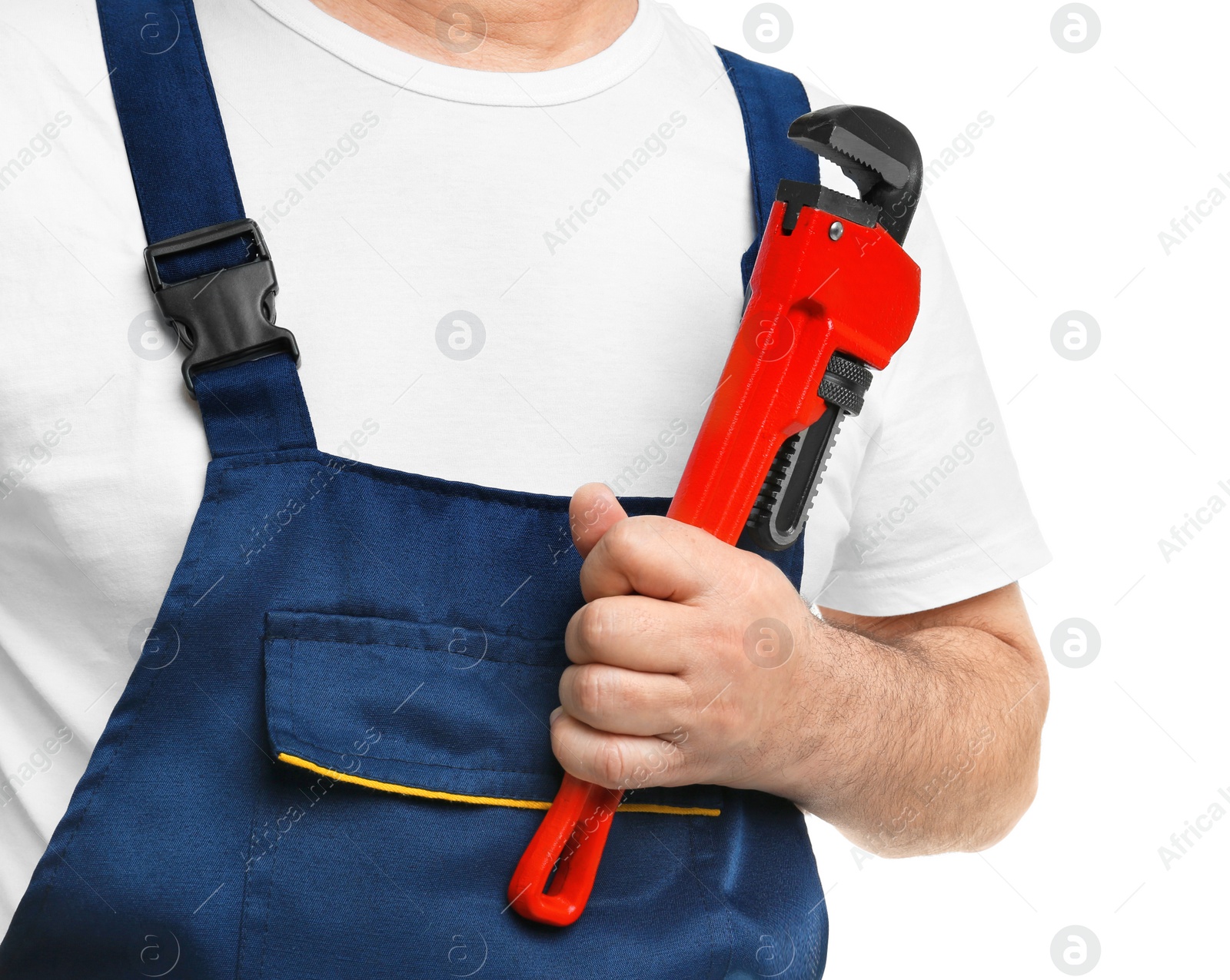 Photo of Mature plumber with pipe wrench on white background