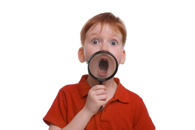 Photo of Surprised boy looking through magnifier glass on white background
