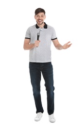 Photo of Handsome man in casual clothes posing with microphone on white background