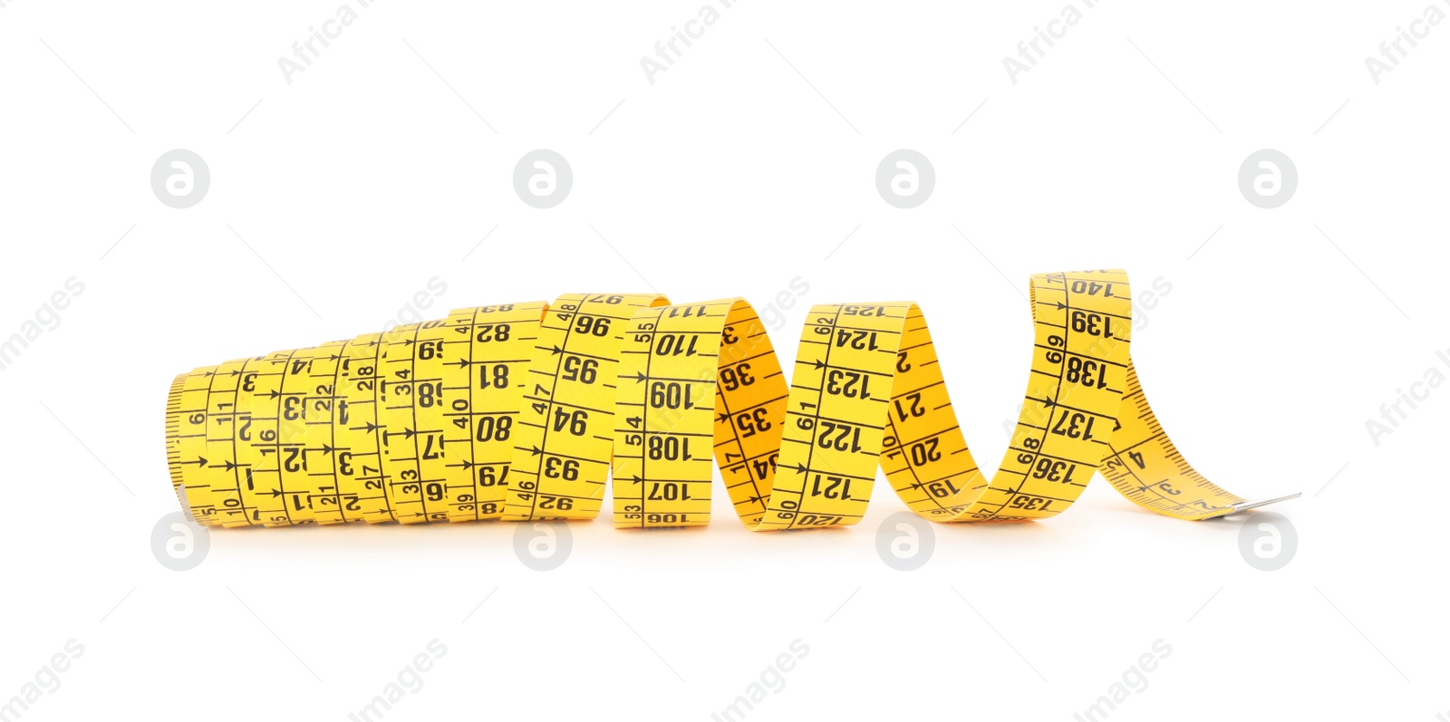 Photo of New yellow measuring tape isolated on white