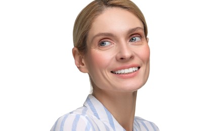 Woman with clean teeth smiling on white background