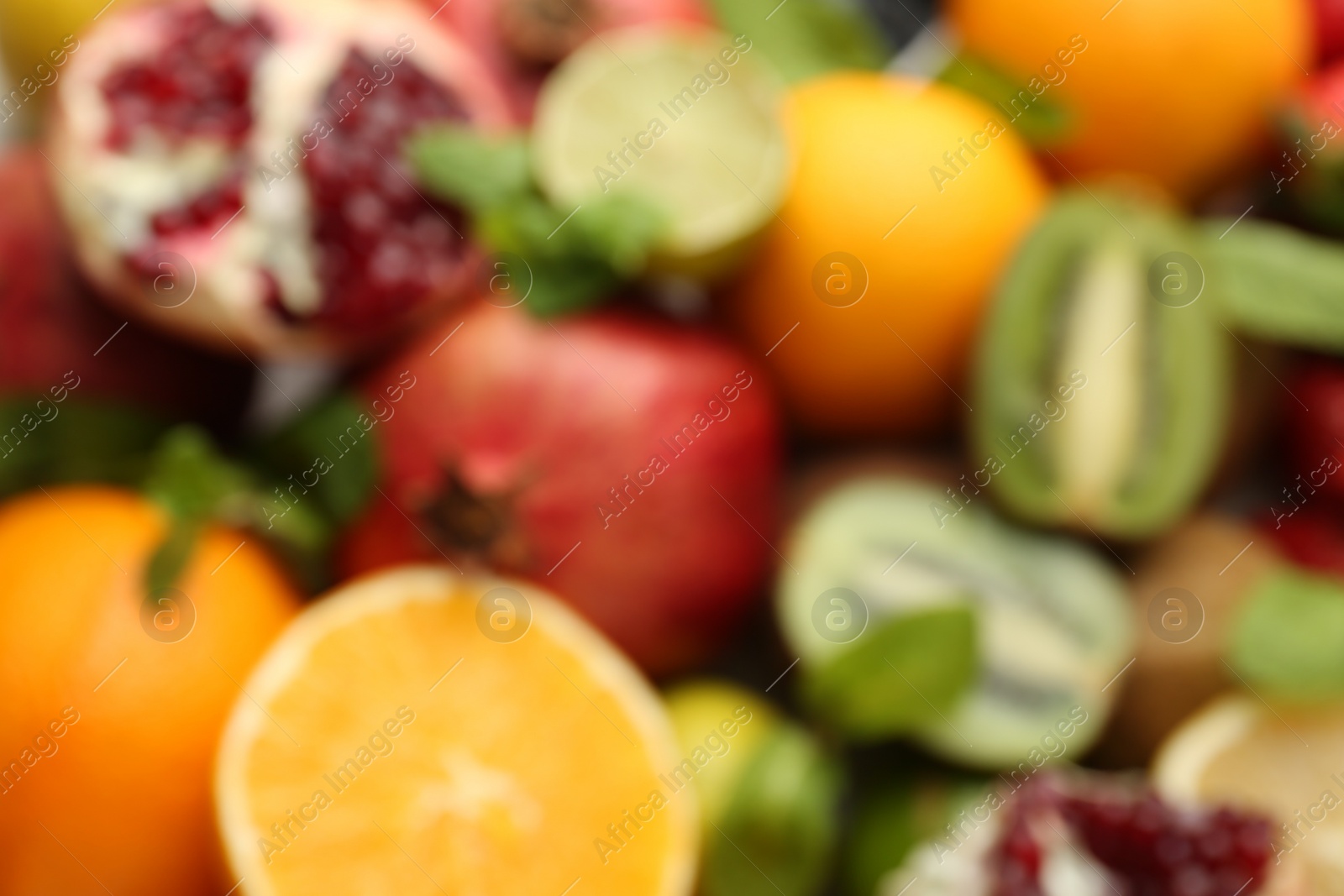 Photo of Many different fruits as background, blurred view