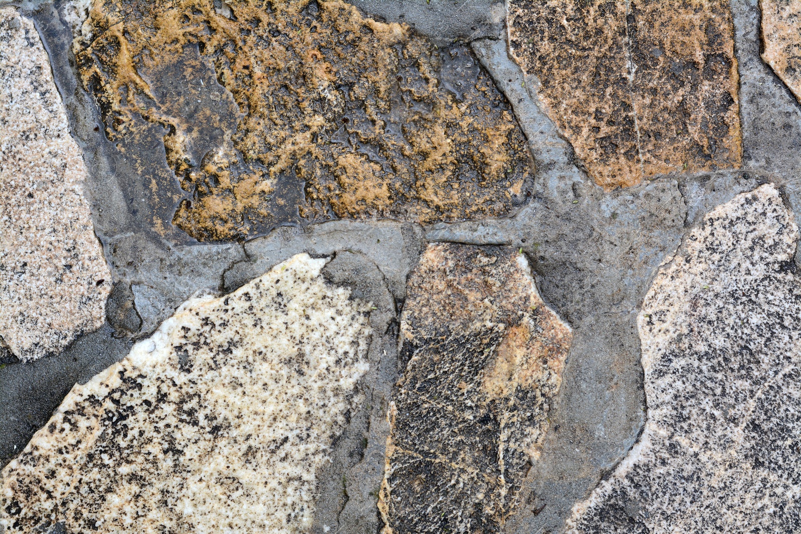 Photo of Closeup view of colorful stone surface as background