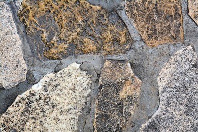 Closeup view of colorful stone surface as background