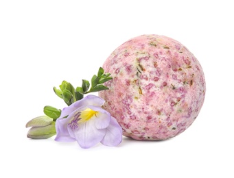 Photo of Bath bomb and flower on white background