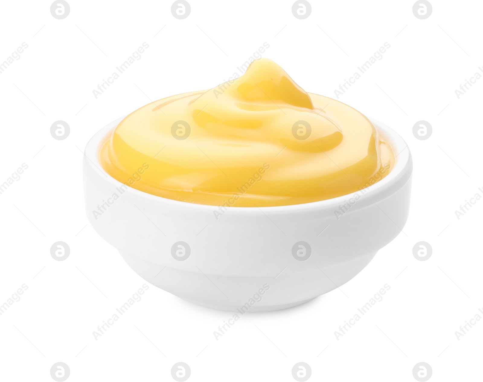 Photo of Delicious cheese sauce in bowl isolated on white