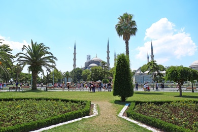 Photo of ISTANBUL, TURKEY - AUGUST 06, 2018: Beautiful garden near Sultan Ahmed mosque