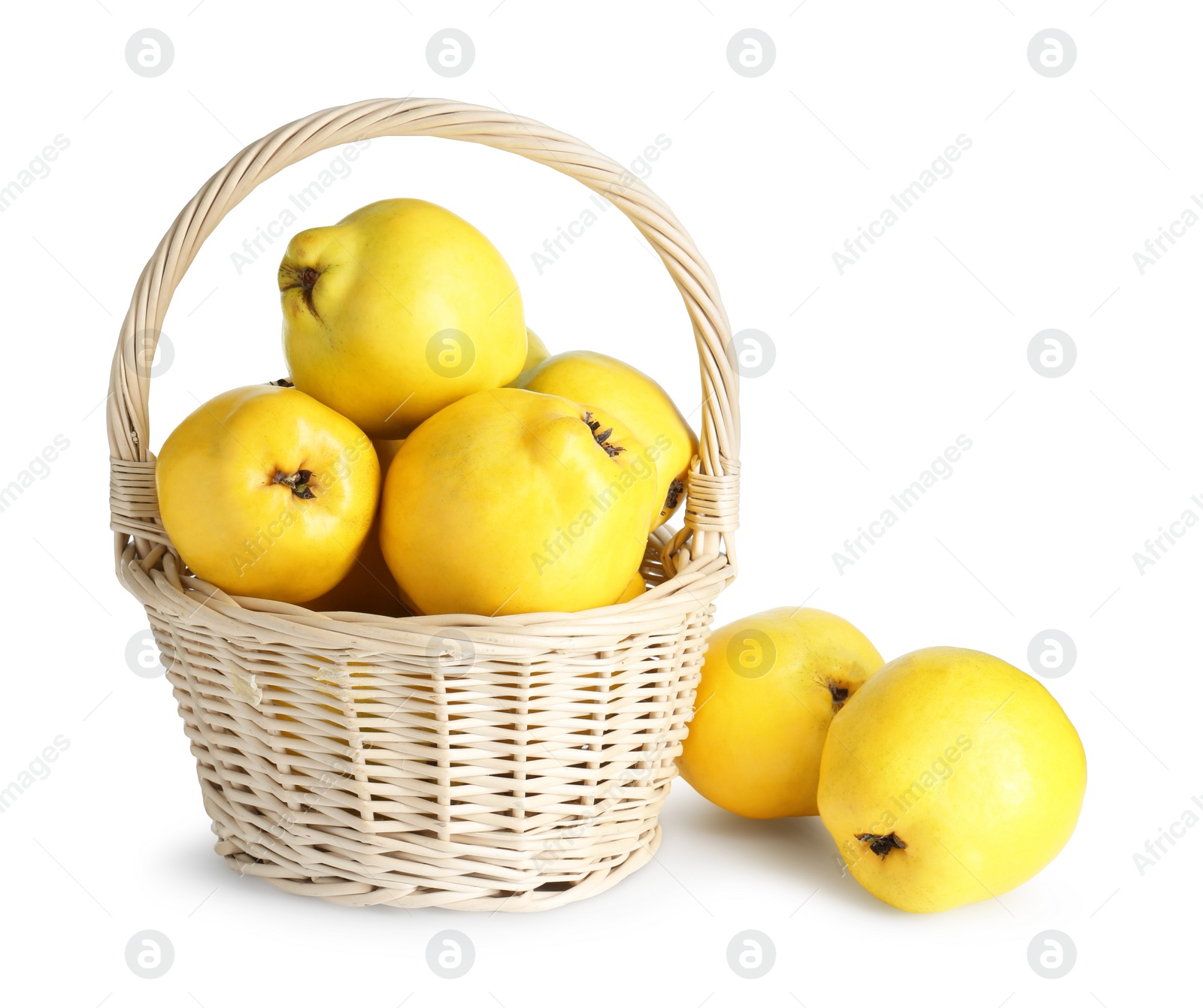 Photo of Basket with delicious fresh ripe quinces isolated on white