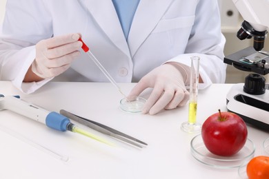 Photo of Quality control. Food inspector checking safety of products in laboratory, closeup