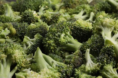 Fresh raw broccoli as background, closeup view